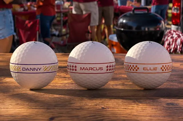 Game Day Collection — team-color AlignXL ball on a tailgate